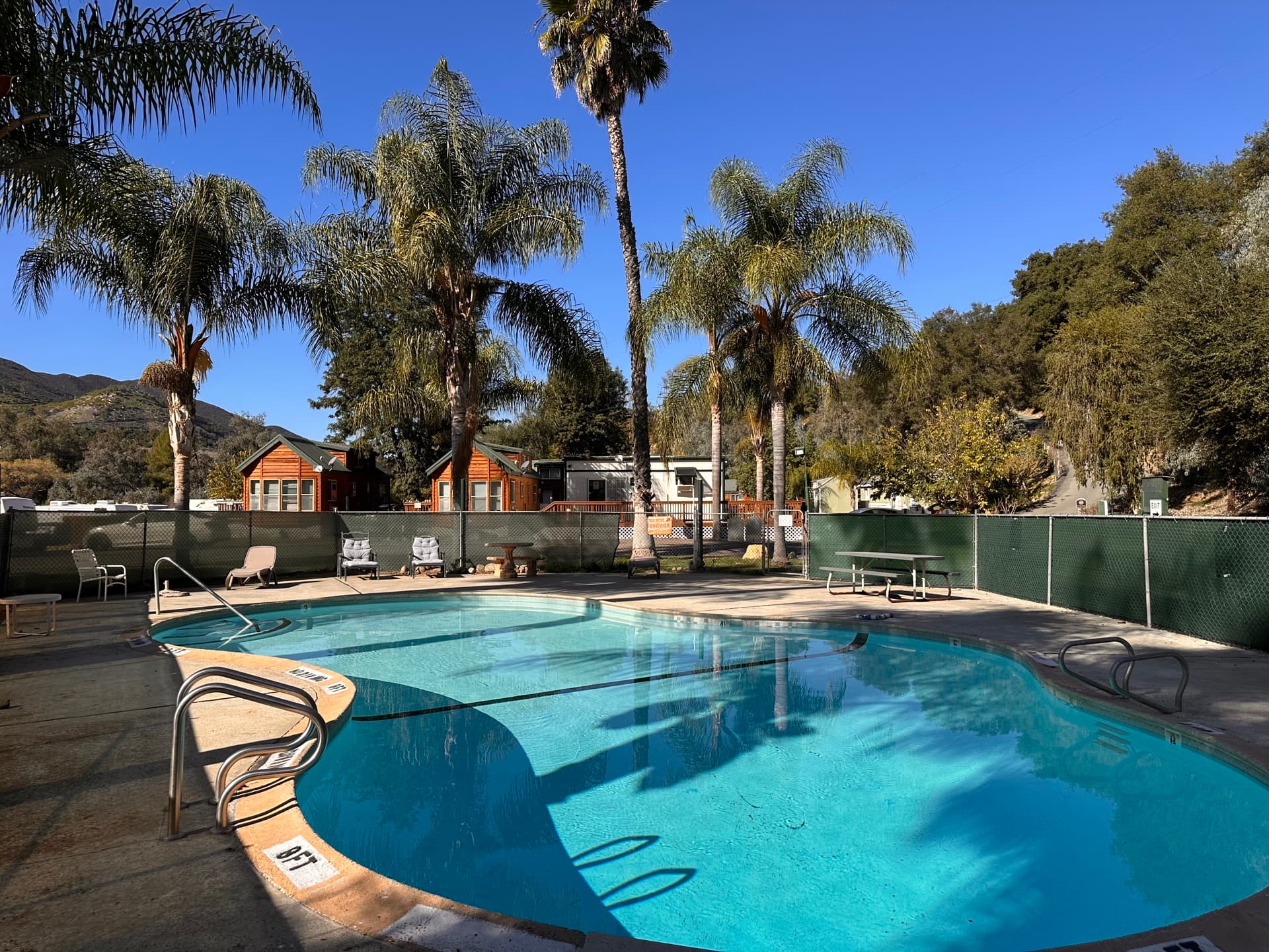 Pool with palm trees at Rancho Corrido Park Pauma Valley CA